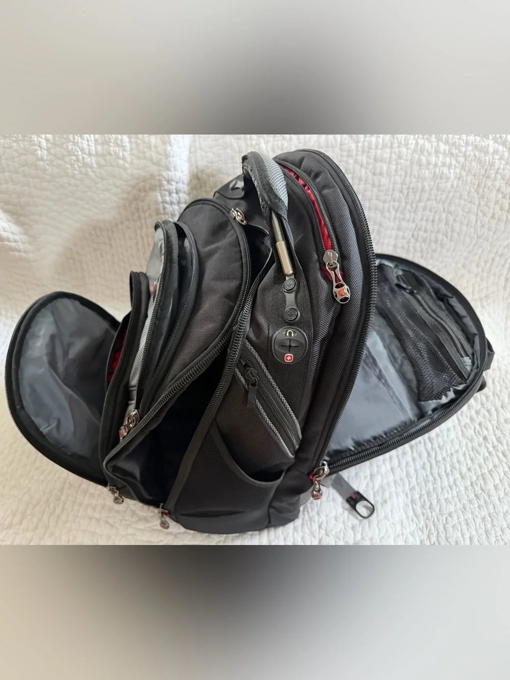 SwissGear Black and Gray Backpack with Red Logo Accent